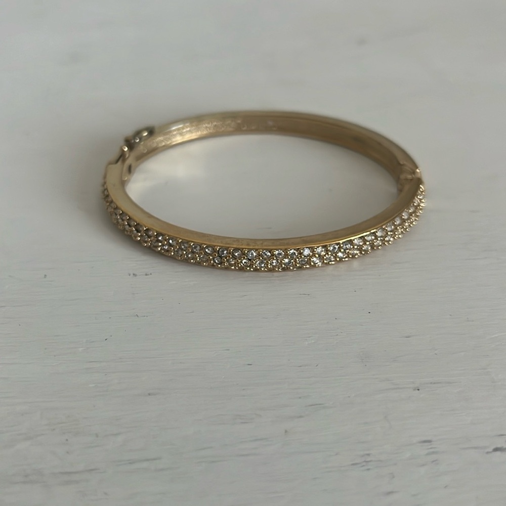 Gold tone costume jewelry bangle